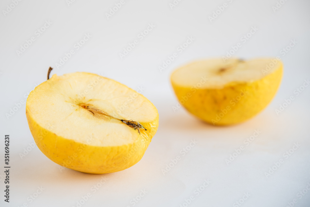 Slices of rotten dry apple on a white background