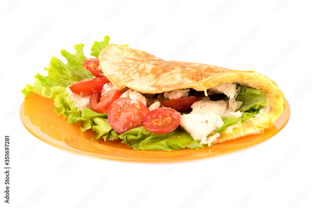 Pancake made from oatmeal, oiled with yogurt and stuffed with chicken fillet, lettuce and tomato.
