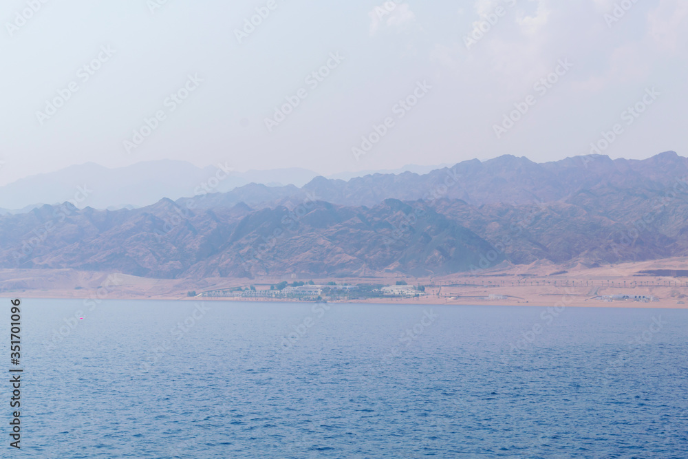 blue sea, nature landscape of mountains and calm open ocean