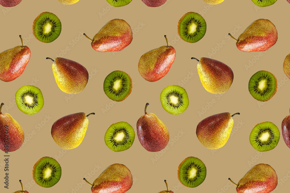 Seamless pattern of red and yellow pears and kiwi slices on a yellow background. The texture of the food Seamless pattern of red and yellow pears and kiwi slices on a yellow background. The texture of the food