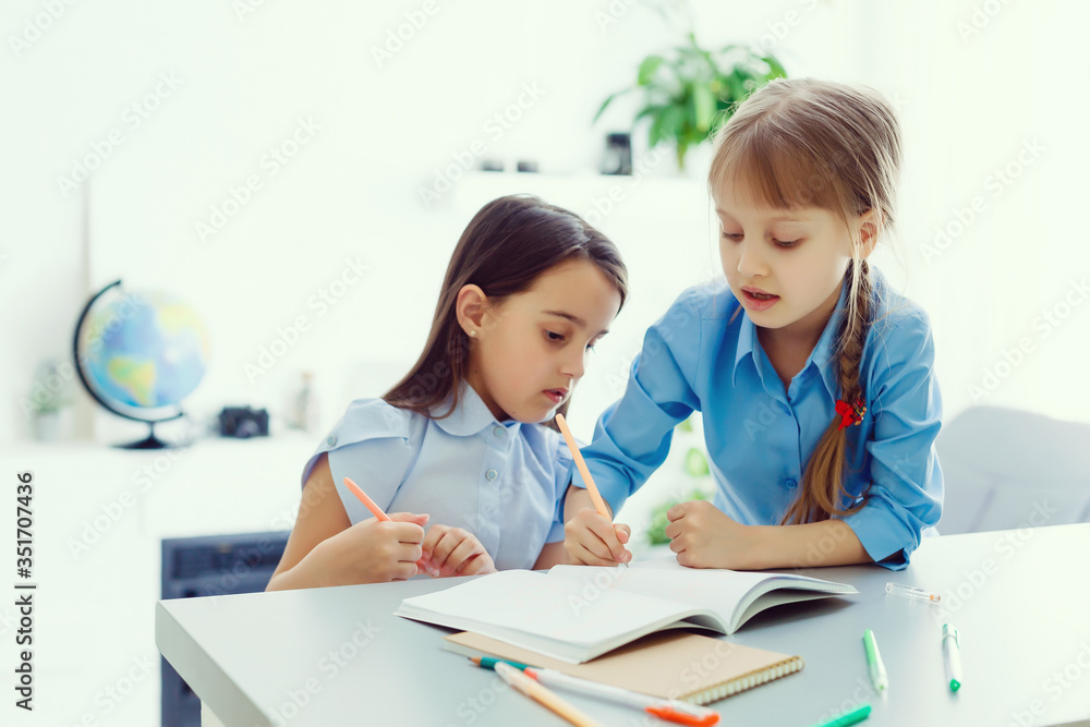 Learning from home, Home school kid concept. Little children study online learning from home with laptop. Quarantine and Social distancing concept. Learning from home, Home school kid concept. Little children study online learning from home with laptop. Quarantine and Social distancing concept.