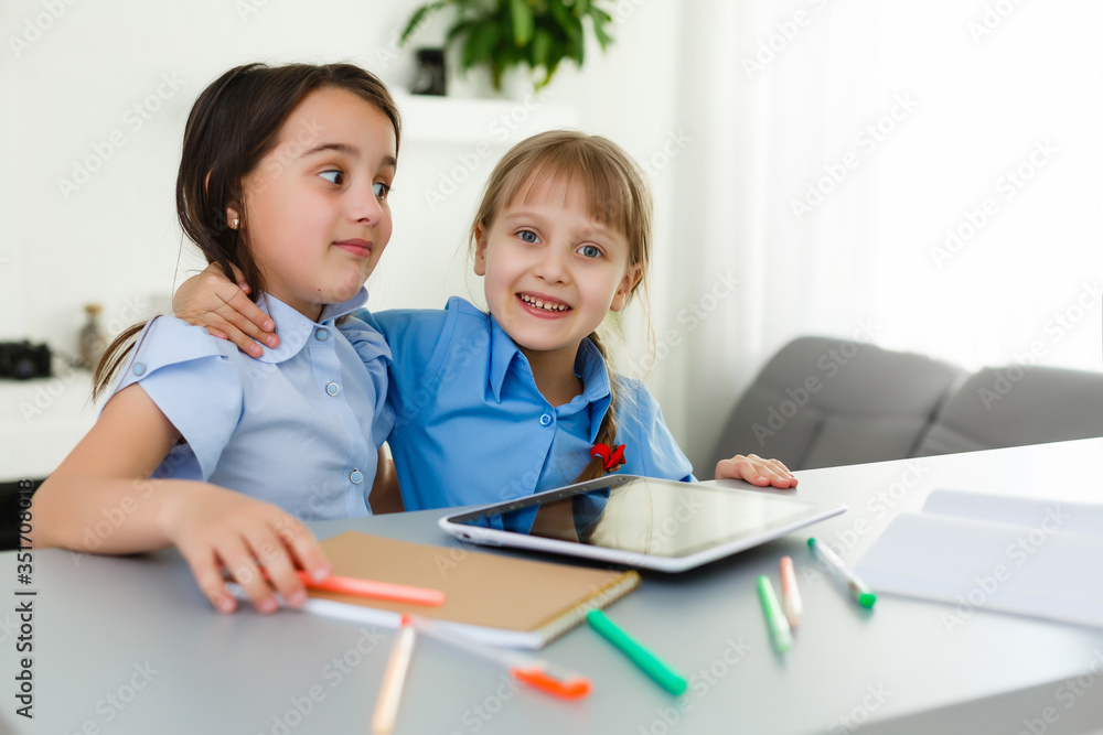Learning from home, Home school kid concept. Little children study online learning from home with laptop. Quarantine and Social distancing concept. Learning from home, Home school kid concept. Little children study online learning from home with laptop. Quarantine and Social distancing concept.