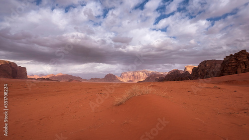 Wadi Rum desert under a beautiful sky with clouds