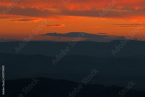 mountains and valleys during dusk