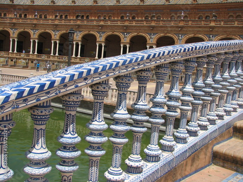 Ceramic handrails on the Spanish Square in Seville on a sunny day.