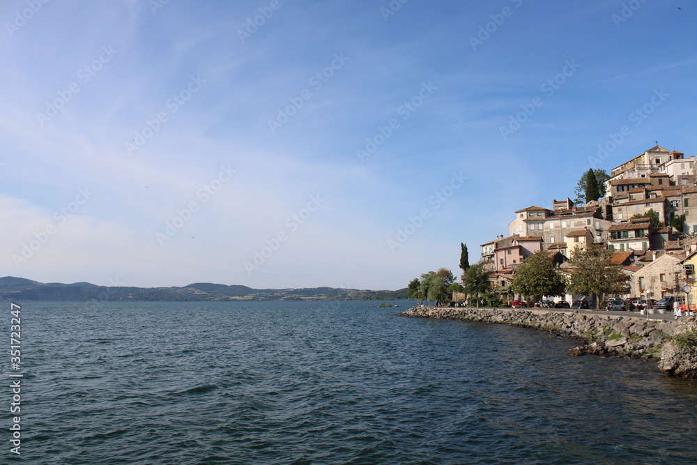 view old village on the bank of lake with sky beautiful landscape 