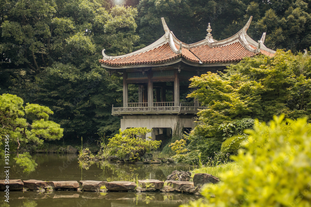 Japanese temple in a garden 
