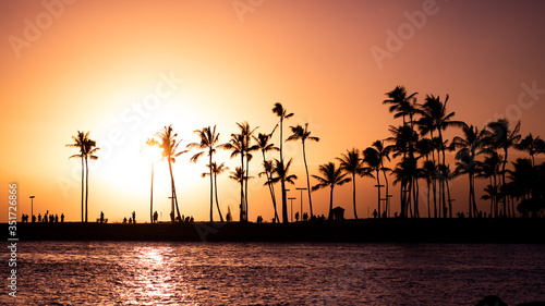Silhouette Palm Trees By Sea Against Sky During Sunset
