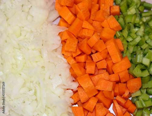 Mirepoix, the combination of carrot, celery and onion, is widely used in the preparation of different dishes. photo