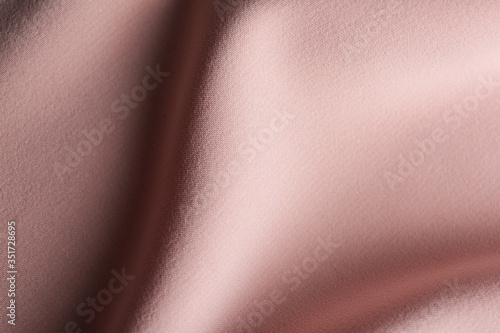 Texture of beautiful pink fabric as background, closeup