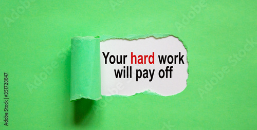 The text 'your hard work will pay off' appearing behind torn green paper. Beautiful background, copy space.