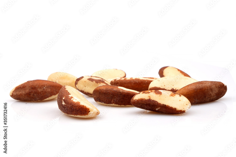 Studio shot of organic brazil nuts on white background Studio shot of organic brazil nuts on white background