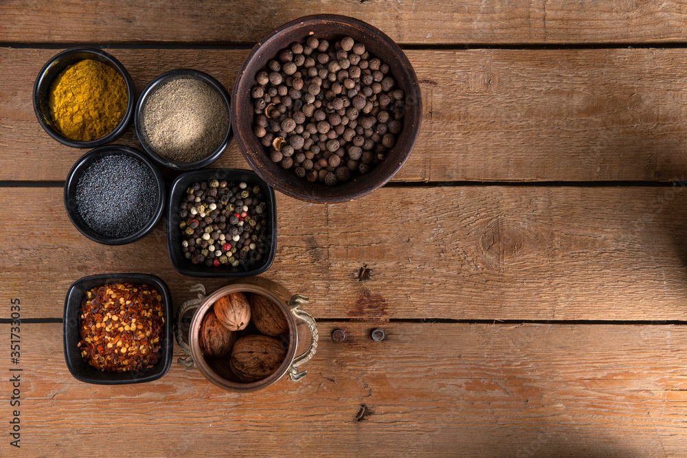 Different shape of bowls with spices Different shape of bowls with spices