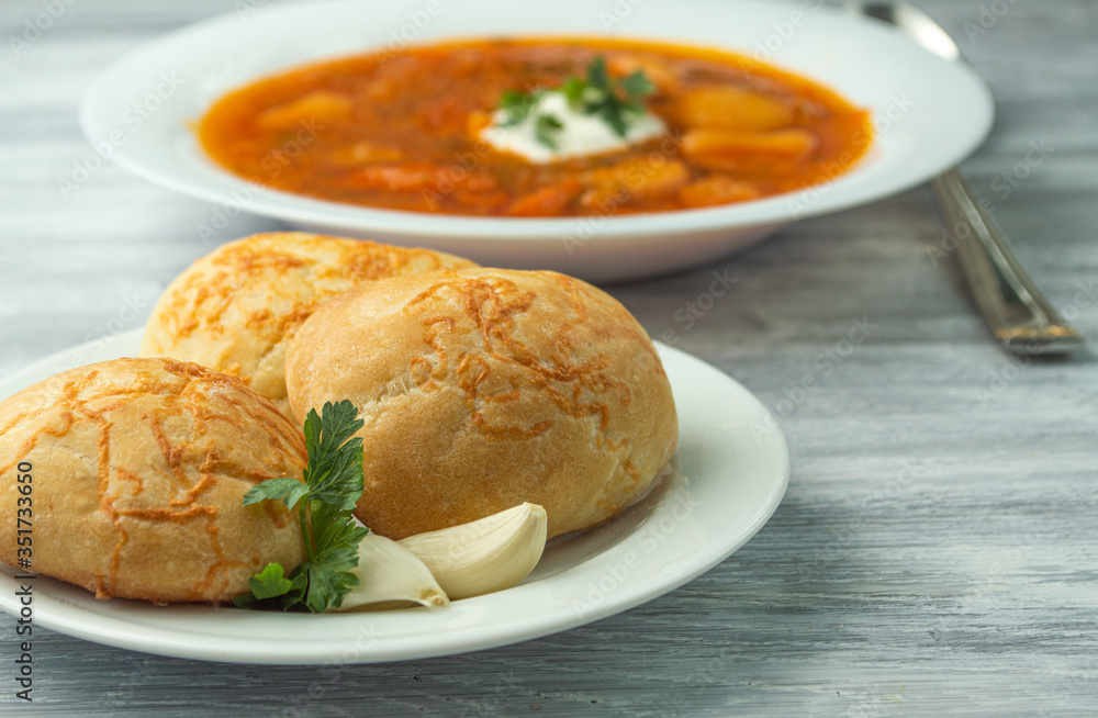 Ukrainian borscht with donuts and sour cream. Ukrainian borscht with donuts and sour cream.