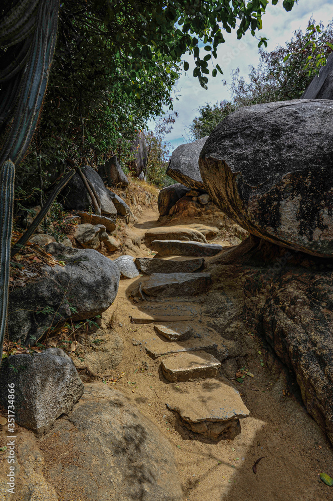 A close up of a rocky path leading to the beach in Virgin Gorda, British Virgin Island A close up of a rocky path leading to the beach in Virgin Gorda, British Virgin Island