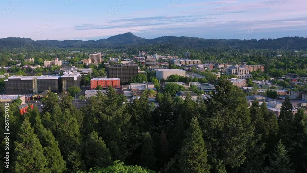 Aerial view flying sideways of Eugene Oregon on sunny afternoon. Aerial view flying sideways of Eugene Oregon on sunny afternoon.