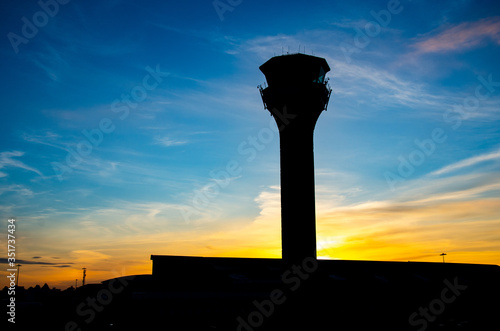 London Luton Aiport's Control Tower in the sunset. Silhouette picture.
