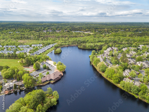 Aerial photo of the lake in the countryside living community © oldmn