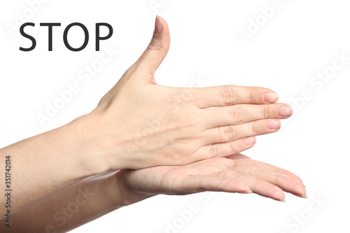 Woman showing word Stop on white background, closeup. American sign language photo