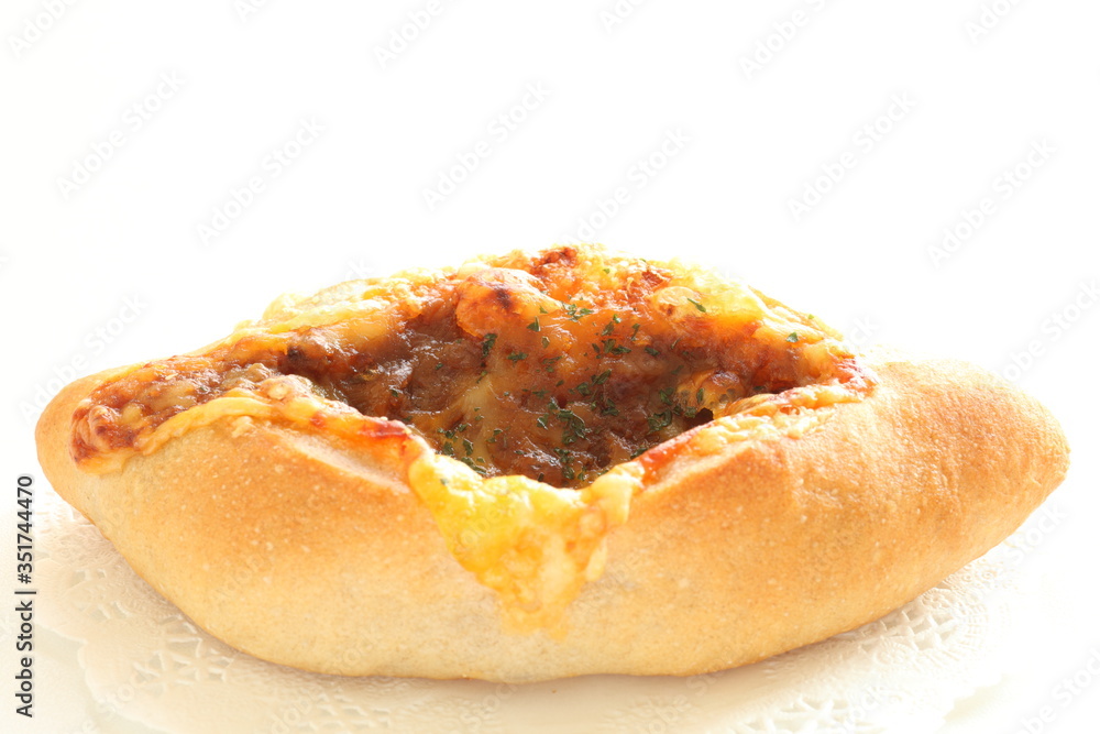 Cheese and mince meat French bread on white dish for breakfast Cheese and mince meat French bread on white dish for breakfast