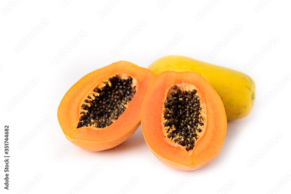 Half ripe papaya fruit isolated on white background Half ripe papaya fruit isolated on white background