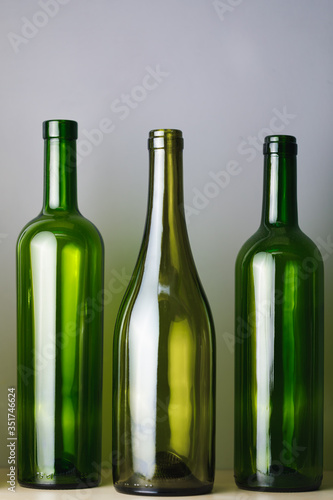 empty wine bottles, gray background