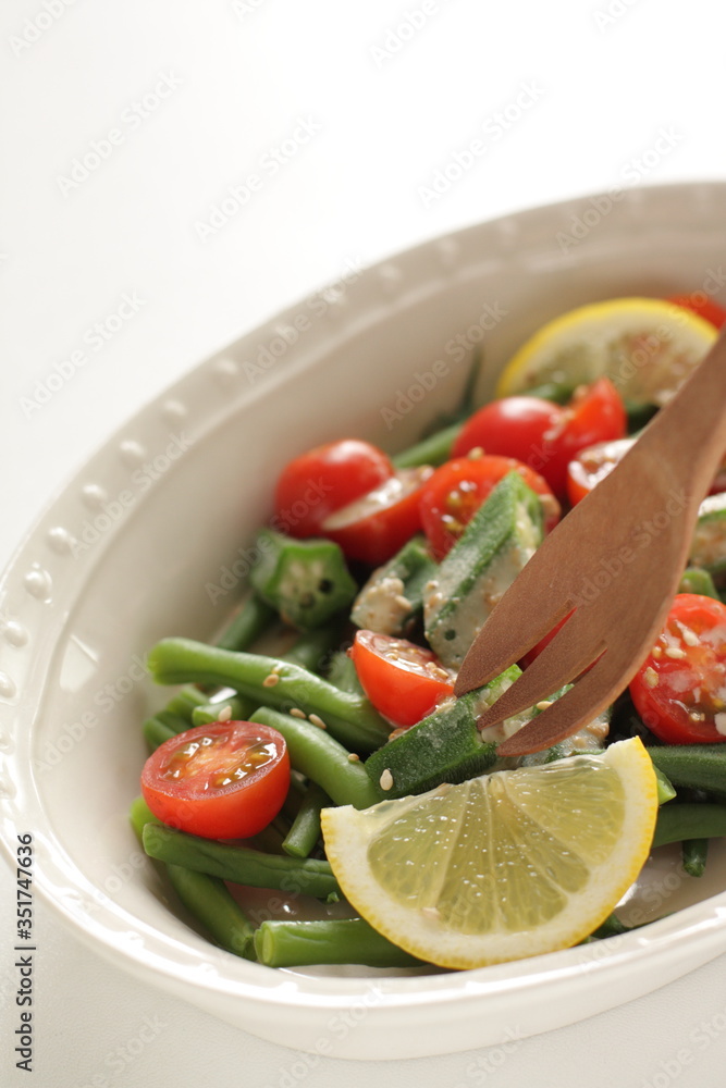 Homemade cherry tomato and Okra with sesame dressing salad Homemade cherry tomato and Okra with sesame dressing salad