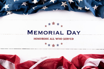 Happy Memorial Day, May 25. American flags against white wooden background. Flat lay with copy space.