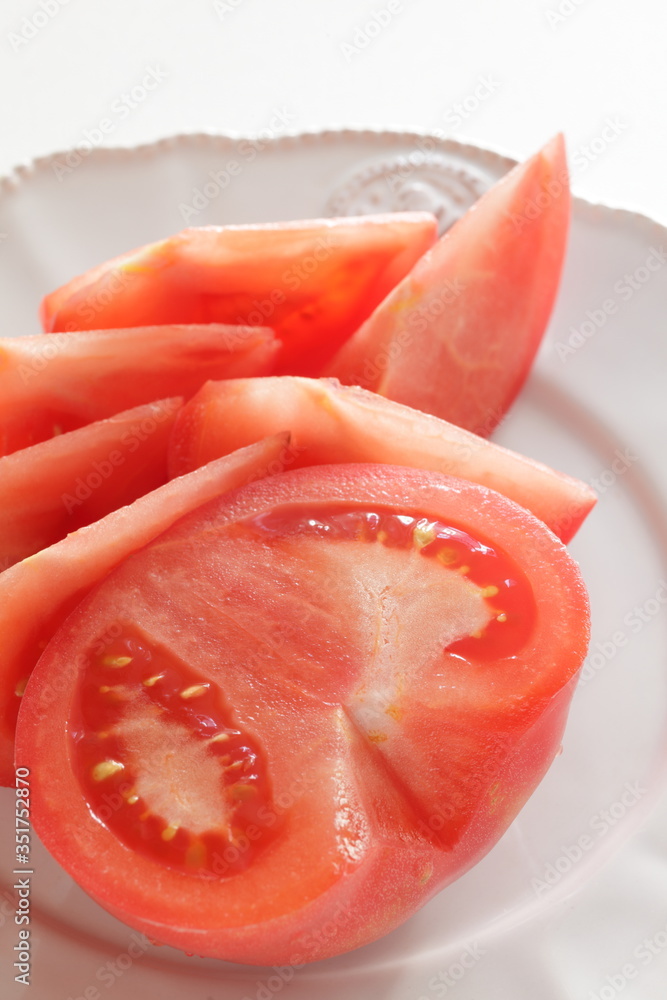 Fototapeta premium Freshness cut tomato on dish for healthy food ingredient
