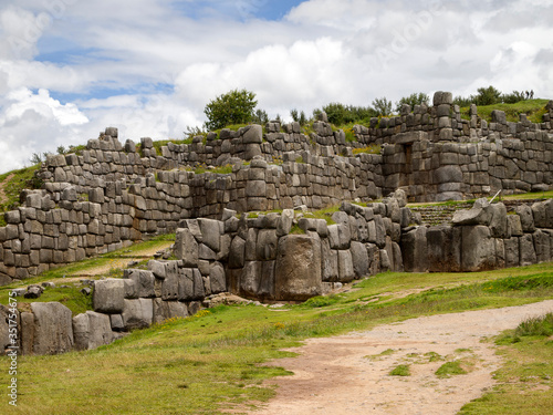 Sacsayhuaman. a walled complex and ancient inca fortress on the northern outskirts of the city of Cusco, Peru, the former capital of the Inca Empire. photo