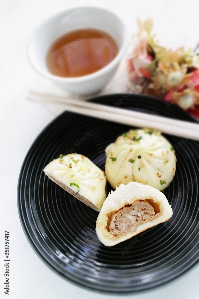 Chinese food, dumping Sheng Jian Bao pan fried meat bun Chinese food, dumping Sheng Jian Bao pan fried meat bun