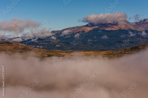 Scene view of Andes mountain landscape with low clouds in Esquel, Patagonia, Argentina