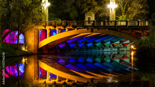 A night shot of the King William Street bridge lit up with multiple colours in Adelaide South Australia on the 21st May 2020