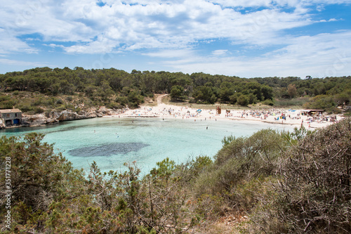 Beach with people and sea landscape in Santanyi  Majorca