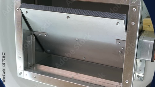 Automatic fire damper. The damper opens and closes