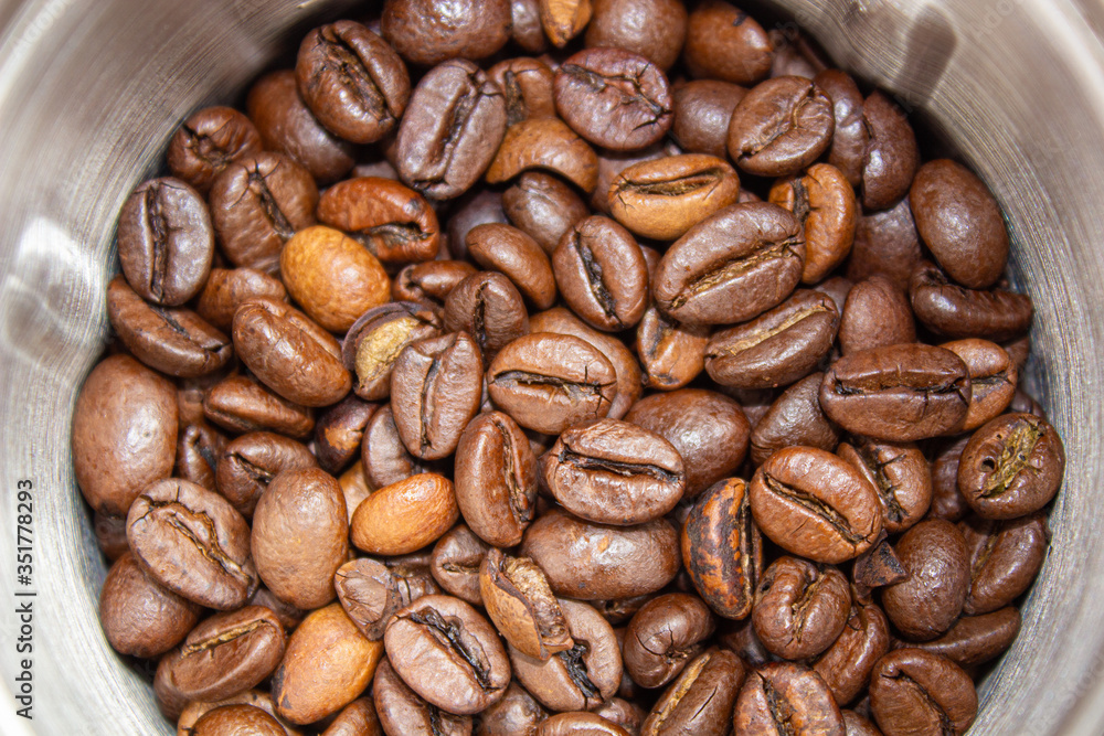 Fototapeta premium Closeup picture of coffee bean grinder and coffee bean