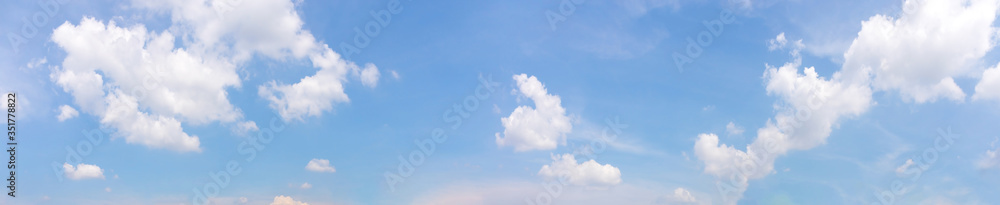 Panorama or panoramic photo of blue sky and white clouds or cloudscape. Panorama or panoramic photo of blue sky and white clouds or cloudscape.