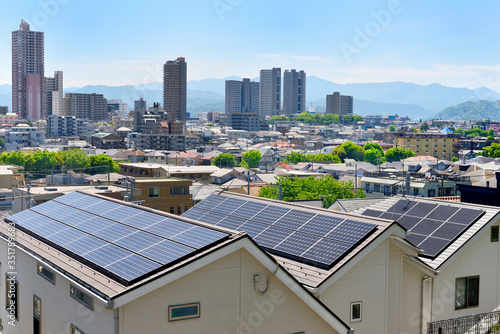 Solar panels and Japanese cityscape   ソーラーパネルと日本の街並み

