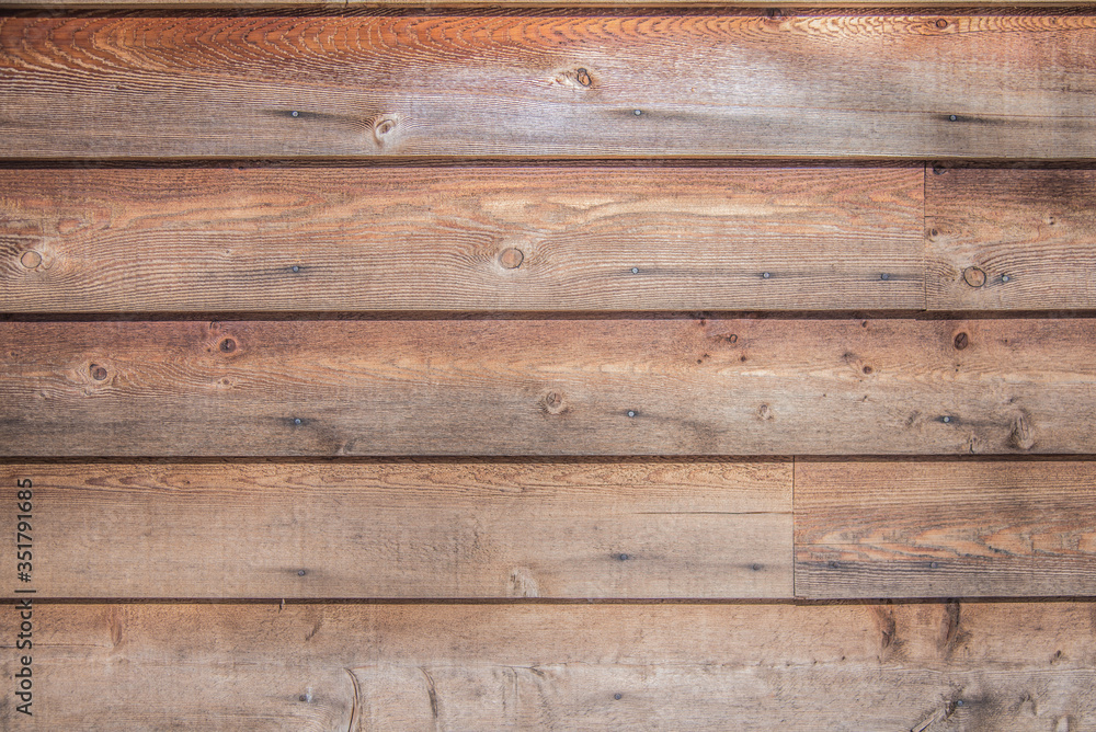 Warm wood siding illuminated by a warm winter sun. Warm wood siding illuminated by a warm winter sun.