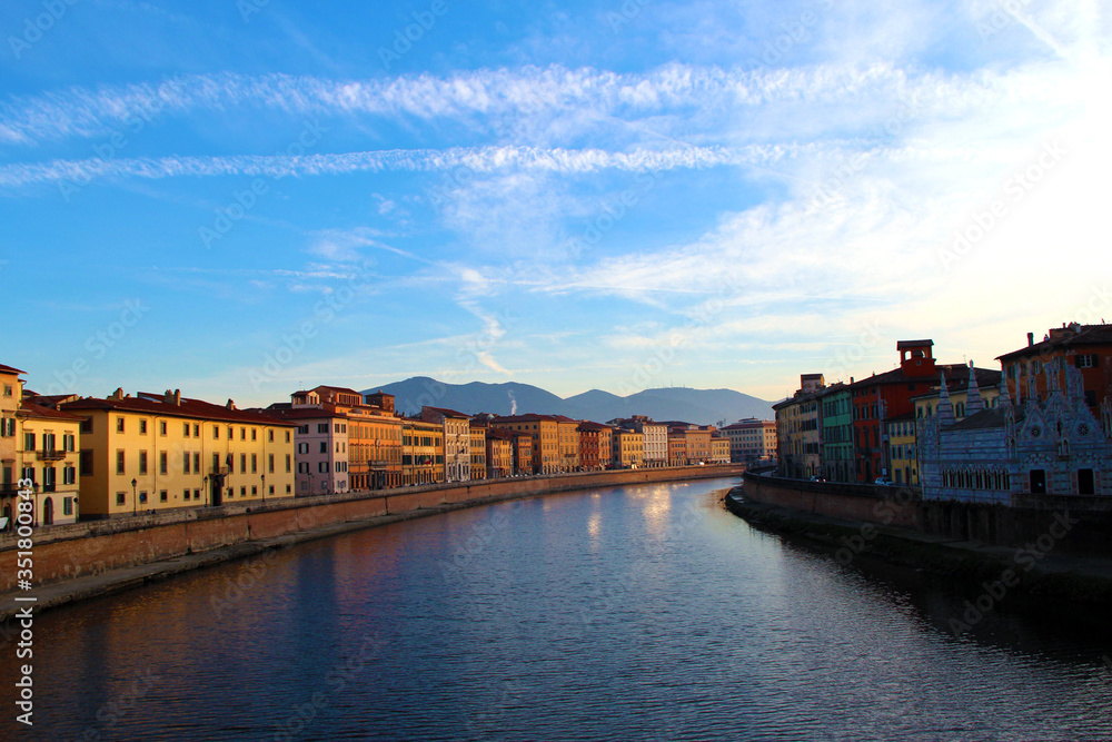 beautiful sky and river view by the bridge in pisa italy