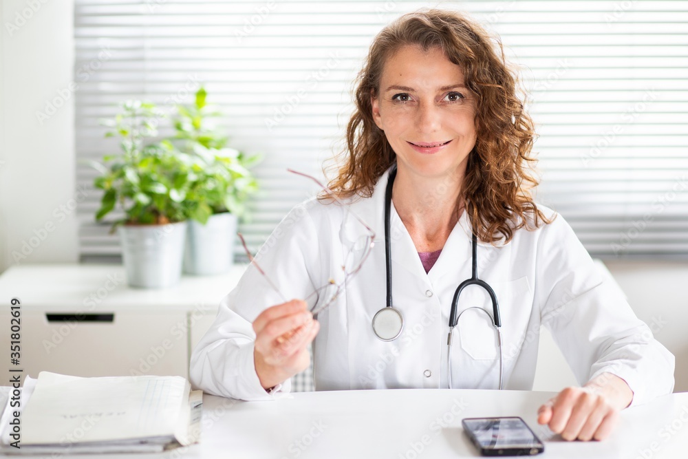 portrait of female doctor with stethoscope portrait of female doctor with stethoscope