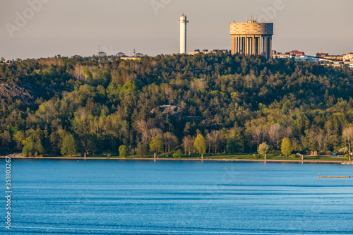 Stockholm, Sweden A view from the Ekero suburb of The Satra beach and Satra water tower over Lake Malaren. photo