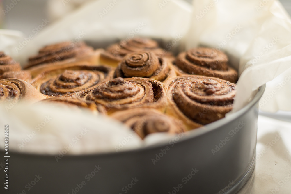 Fresh rolls Cinnabon, Cinnamon rolls in the form. Flavorful pastries Fresh rolls Cinnabon, Cinnamon rolls in the form. Flavorful pastries