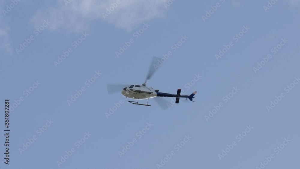 SLOW MOTION, Chopper Flying Overhead On A Sunny Day SLOW MOTION, Chopper Flying Overhead On A Sunny Day