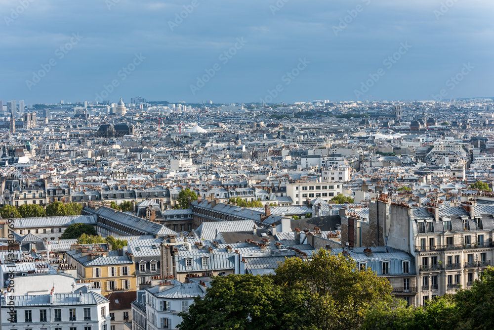 Aerial view of the old town of Paris, view from the The Basilica of the Sacred Heart of Paris, at the summit of the butte Montmartre, the highest point in Paris, France