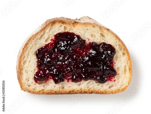 Blueberry jam and bread on a white background