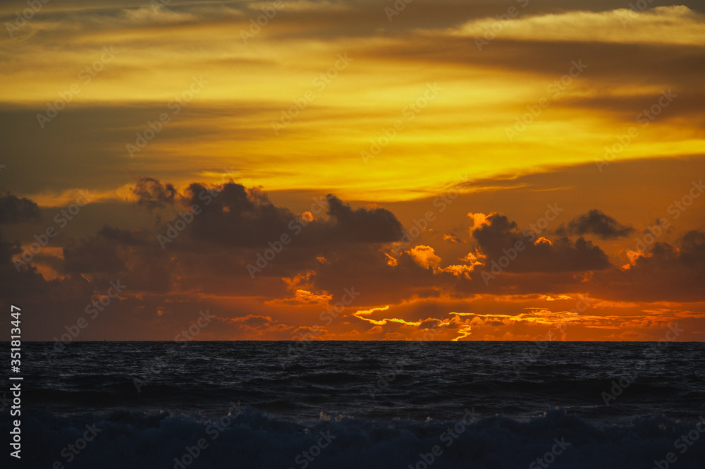 Magical dramatic sunset on a tropical beach. Magical dramatic sunset on a tropical beach.