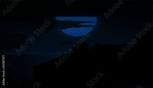 Vector graphic of the beautiful night view of a mountain range and the bright moon hidden behind the heavy clouds.