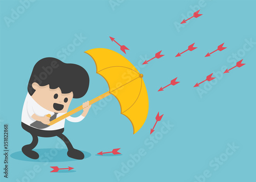 Fototapeta Naklejka Na Ścianę i Meble -  Young  businessman use umbrella to protecting arrow down vector