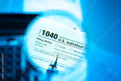 Completing tax return forms in the United States. American tax return. Tax control in America. Mandatory payments for American citizens. The system of taxation in the United States of America.
